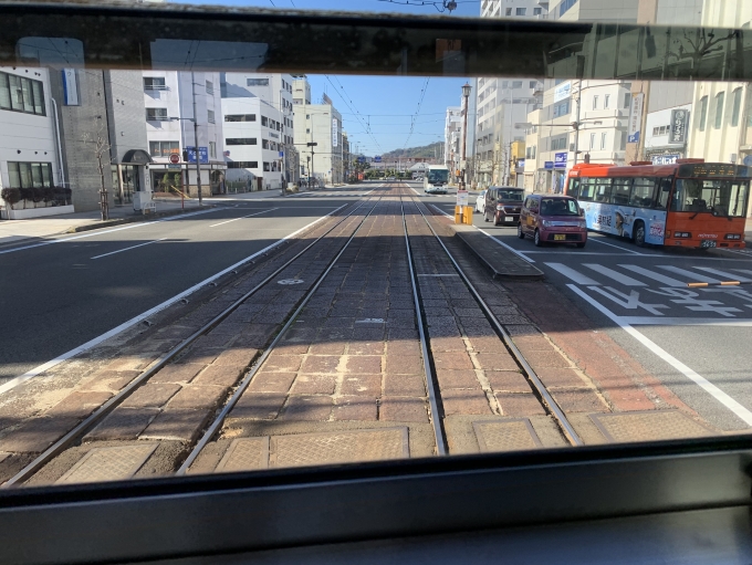 鉄道乗車記録の写真:車窓・風景(3)        「伊予鉄市内電車と鉄道線の平面交差（ダブルクロッシング）。」