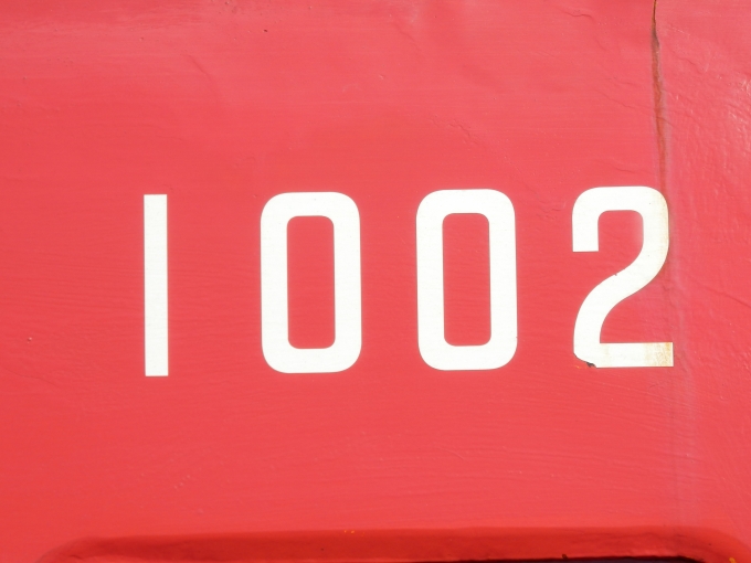 鉄道乗車記録の写真:車両銘板(3)        「1002
銚子電鉄デハ1000形電車」